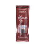 Cherry oil syringe — red-tinted THC oil concentrate