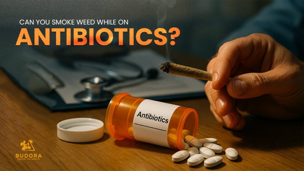 Hand holding a lit joint near an antibiotic bottle.