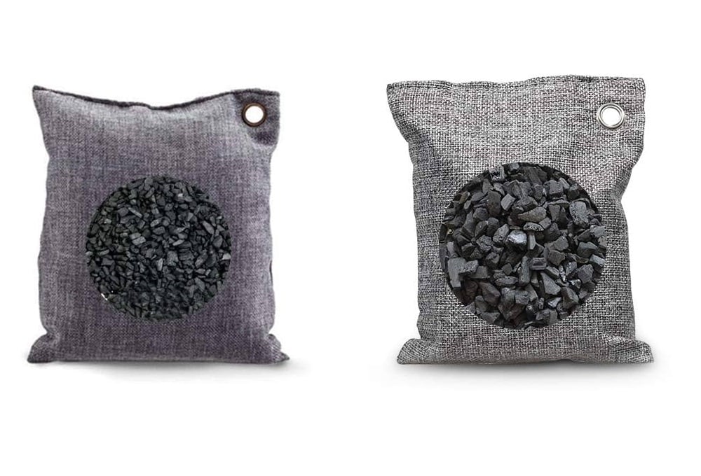 How to Get Smoke Smell Out of a Car: The Complete 2025 Guide 4 Two bags of charcoal are displayed side by side on a neutral background.